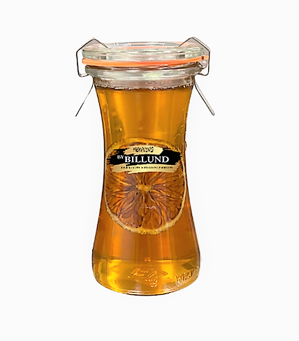 ByBillund tørret limefrugtskiver i flydende honning fra egen bigård
